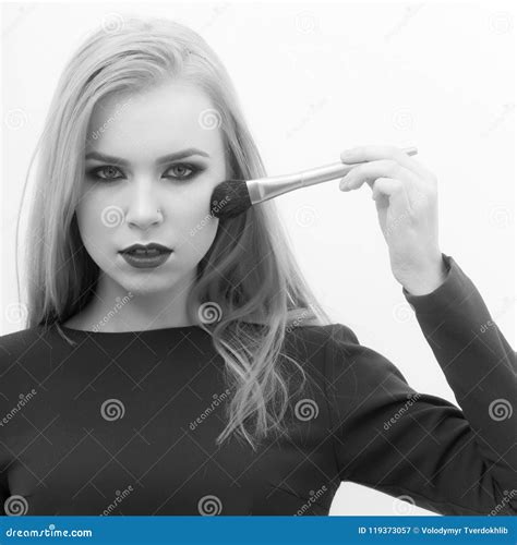 Woman Is Applying Makeup Woman Applying Powder On Face Skin With Makeup Brush Stock Image
