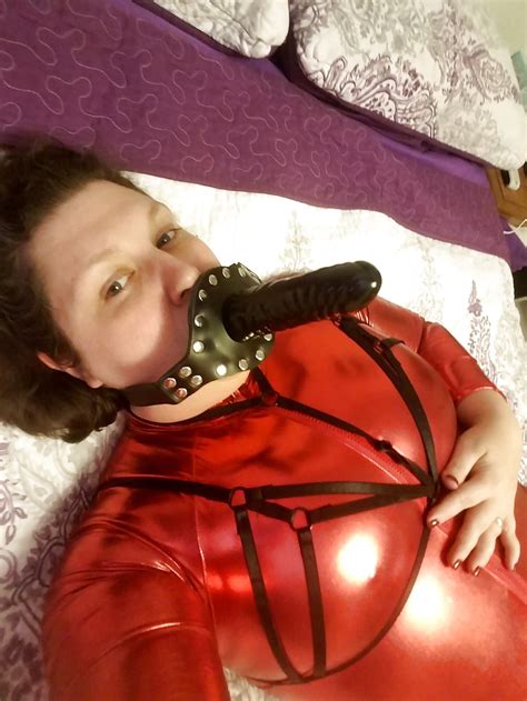 Shiny Red Catsuit Zenati Gas Mask Harness Strapon Porn Pictures