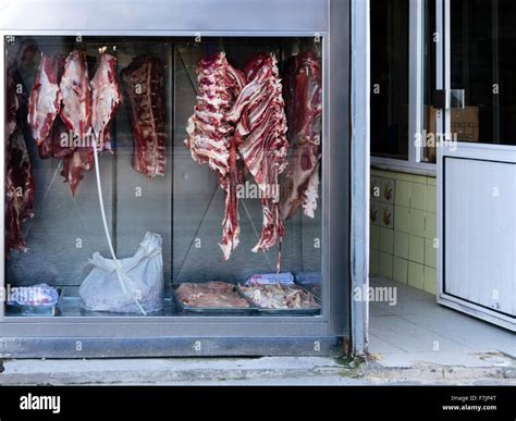Meat Hanging In The Window Of A Butcher Shop In Istanbul Turkey Stock