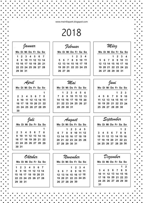 A Black And White Calendar For The New Year With Polka Dots On It Is Shown