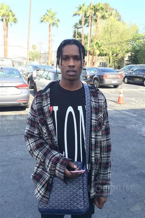 Asap Rocky Posing On A Parking Lot On Looklive Asap Rocky Outfits