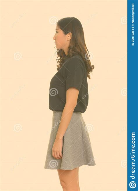 Profile View Of Young Beautiful Asian Businesswoman Stock Photo Image