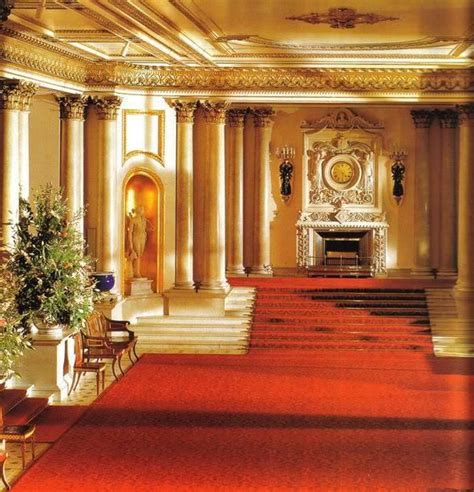 The Interior Of A Large Building With Red Carpet