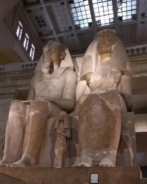 monumental statue of amenhotep iii and queen tiye in egyptian museum in cairo in egypt