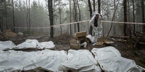 Top Ukraine Official Says 450 Bodies Found In Izyum Mass Grave Some
