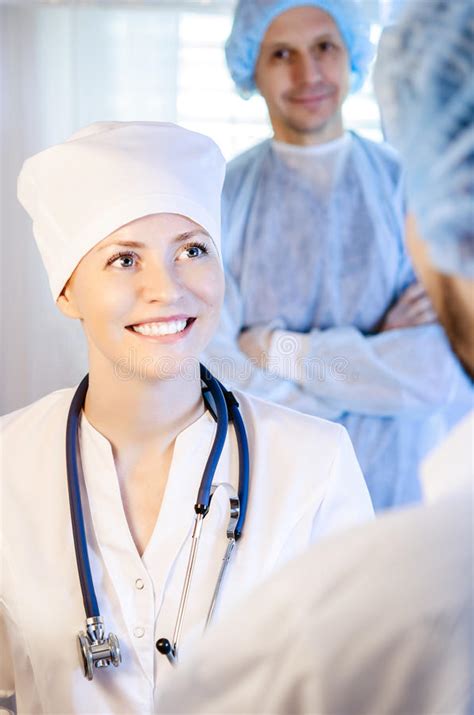 Medical Doctor Portrait In White Coat And Cap Stock Photo Image Of