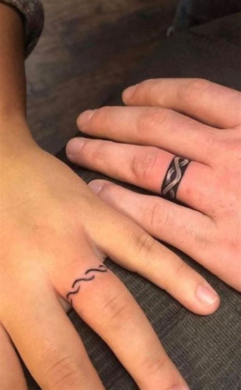 Unique Wedding Ring Tattoos Youll Need To See Tattoo Me Now Infinity Finger Tattoos