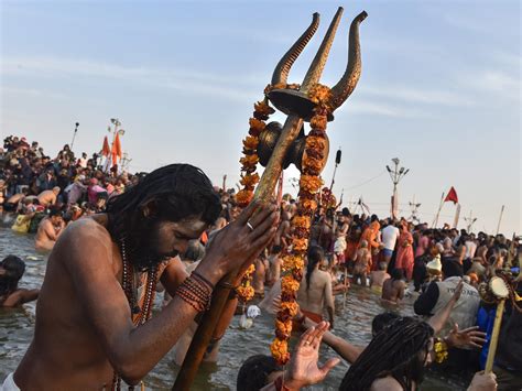 Kumbh Mela Pics Of Devotees And Naga Sadhus Performing Shahi Snan In Prayagraj Will Give