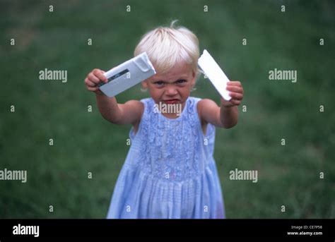 Grumpy Child With Broken Toy Stock Photo Alamy