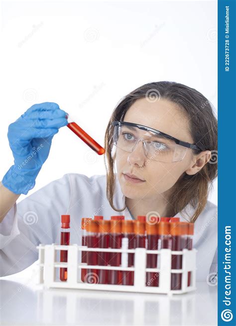 Technician Holding Blood Tube Test In The Research Laboratory Stock