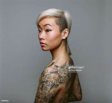 Portrait Of Asian Woman With Blonde Hair Photo Getty Images