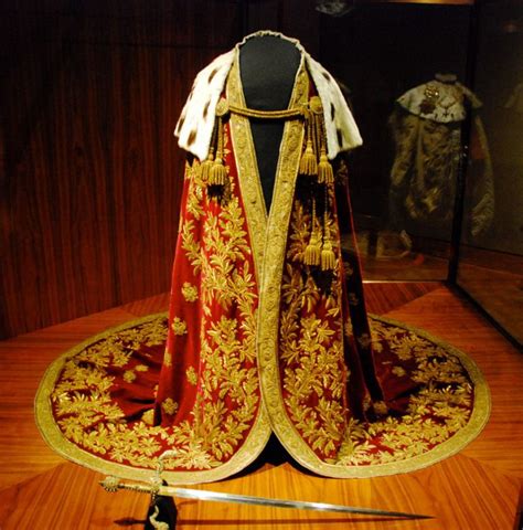 An Elaborate Gold And Red Dress On Display