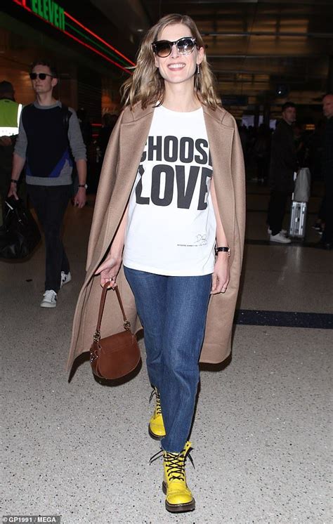 Rosamund Pike Urges Fans To Choose Love In Graphic T Shirt At Lax