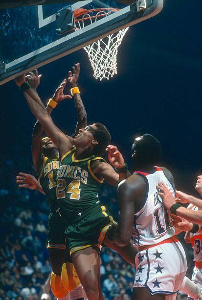 Dennis Johnson Of The Seattle Supersonics Battles For A Rebound Against