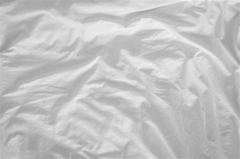 Premium Photo Top View Of F Bedding Sheets And Pillow