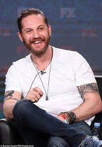 Tom Hardy Shows Off Buff Biceps And Tattoos As He Promotes New Show