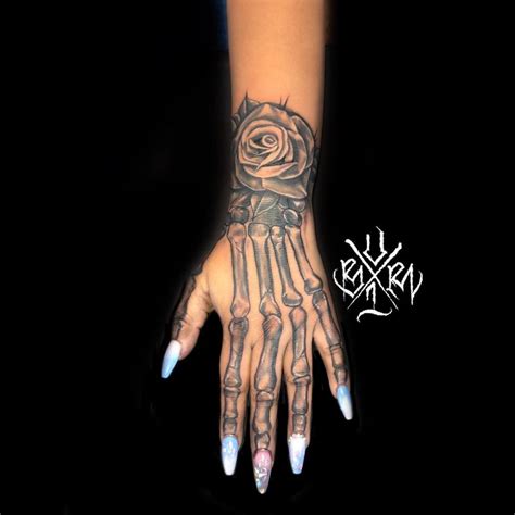 Discover More Than 74 Skeleton Hand Holding Flowers Tattoo Latest In Cdgdbentre