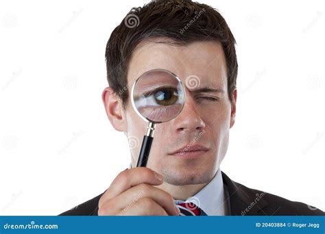 Businessman With Magnifying Glass At Eye Stock Photo Image Of Enlarge