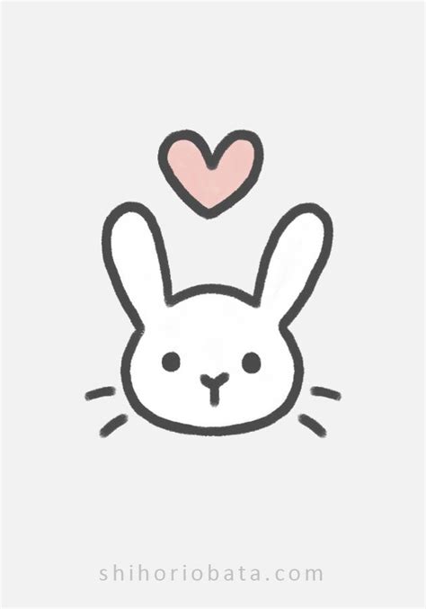 A Rabbit With A Heart On Its Head And The Words Love Is In The Air