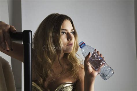 Fashion Model Drinking Water From Bottle In Studio Stock Image Image