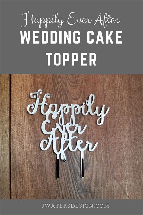 A Cake Topper With The Words Happily Ever After On It And An Image Of A