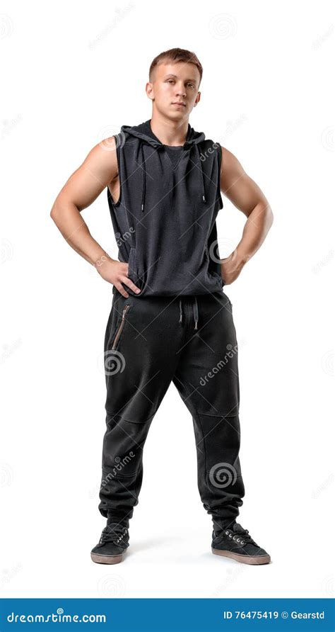 Full Lenght Portrait Of Muscled Young Man With His Hands On Hips Stock