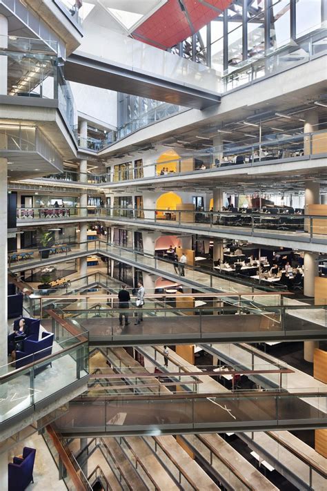 The Interior Of An Office Building With Multiple Levels