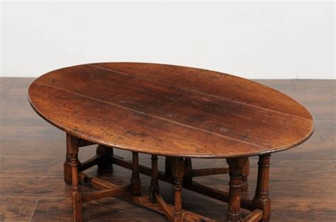 Beautiful range of modern tables. English Oak Drop-Leaf Oval Top Coffee Table with Double ...