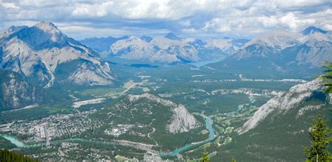Aerial View Of Town Surrounded By Mountain Ranges Photo Free Jasper