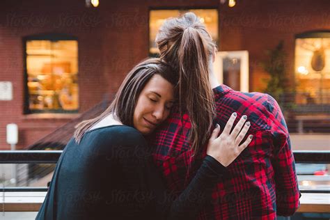 Lesbian Couple On A Date Night Downtown By Stocksy Contributor Kate Ames Stocksy