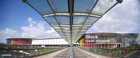 Bustling Airport Terminal With The Bridge Leading To An Entrance Stock