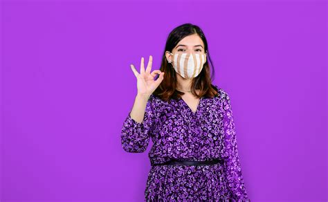 Portrait Of Happy Young Woman Showing Ok Sign In Mask Pixahive