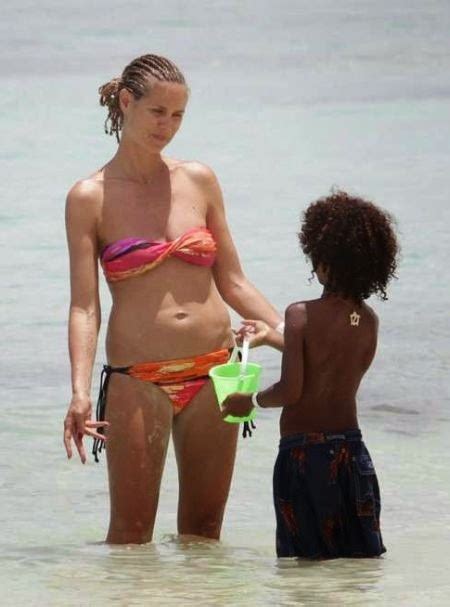 45 photos of heidi klum displays a “colour bikini” in the bahamas beach leopard curves