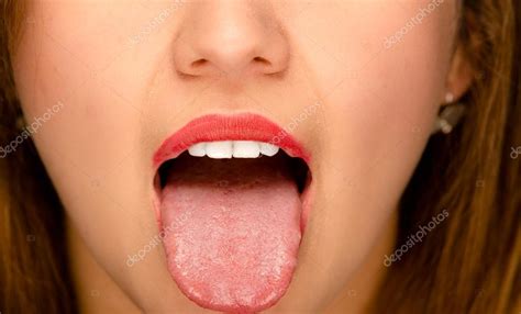 Pictures Of Lips With Tongue Sticking Out