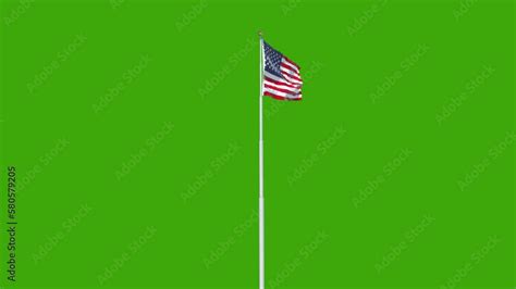 American Flag Pole Fluttering In The Wind Isolated On Green Screen