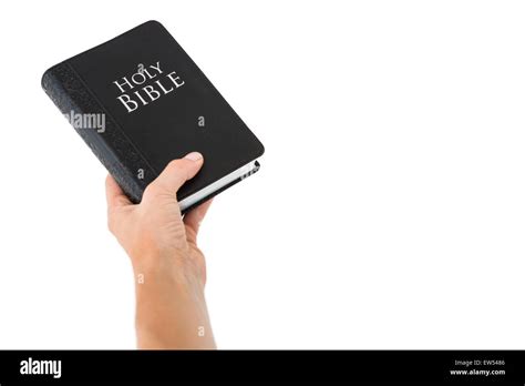 Hand Holding Bible Stock Photo Royalty Free Image 84320998 Alamy
