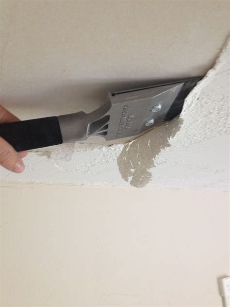 This is a messy process. If you have popcorn ceiling that is covered in paint or ...