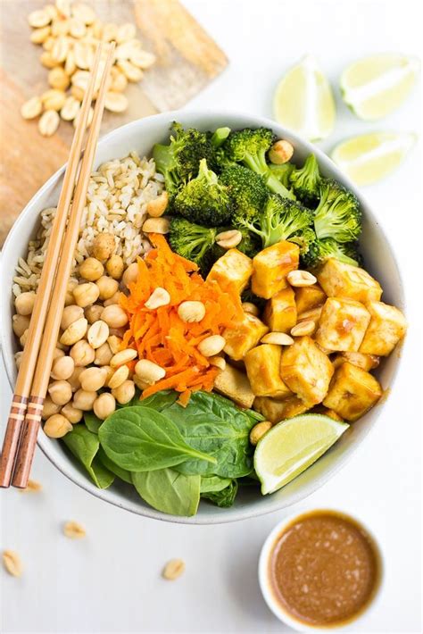 Serve immediately over steamed rice. This Peanut Tofu Buddha Bowl stars simple roasted broccoli, baked chewy tofu and the best Peanut ...