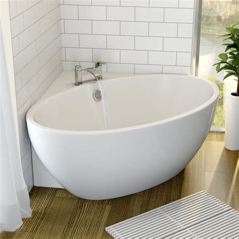 Corner bathtubs are usually designed so that two sides adjoin two walls. Corner Freestanding Space Saving Acrylic Bath 1270aste ...