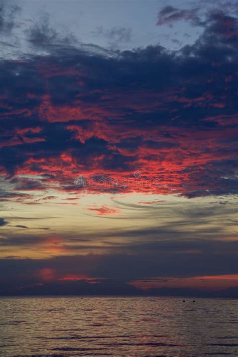 Beautiful And Dramatic Sky At Sunset In Raja Ampat Archipelago Stock