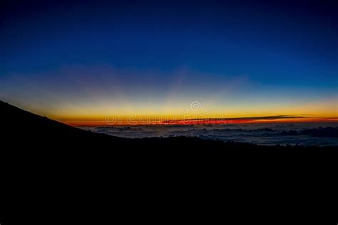 Dramatic Sunset On Top Of Haleakala Crater In Hawaii With Copy Space