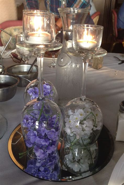 Wine Glass Centerpiece With Flowers And Candles Wine Glass Centerpieces Wine Glass Crafts