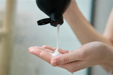Woman Pouring Shampoo On Hand In Bathroom Stock Photo Image Of