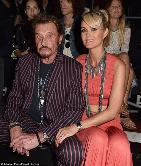 Johnny Hallyday And Wife Laeticia Attend Saint Laurent Show Daily