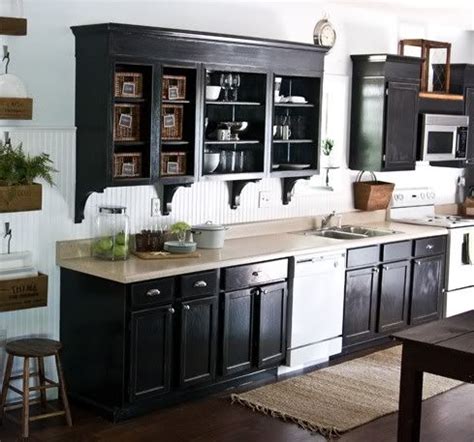 If you're interested in taking this route, try tying in the black of the appliances with other aspects of the kitchen. what color cabinets go with white appliances | ... of ...