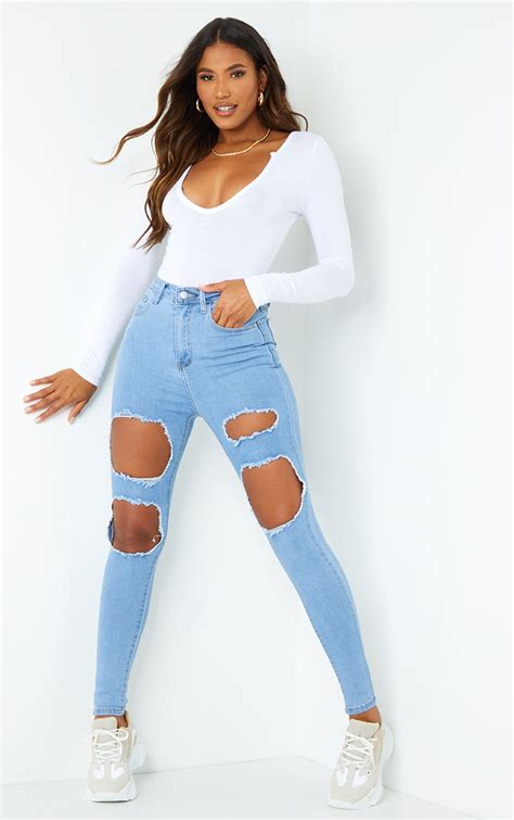 Light Wash Open Thigh Ripped Skinny Jeans Prettylittlething