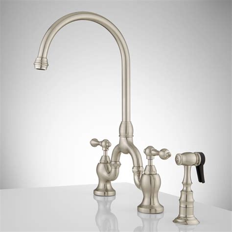 You may want to install a new style of faucet to go in part with a new makeover of the space. Unlacquered Brass Wall Mount Kitchen Faucet