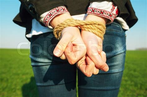 Female Hands Tied Up With The Rope Stock Image Colourbox
