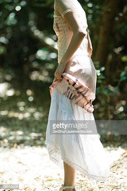 Woman Lifting Skirt Photos Et Images De Collection Getty Images
