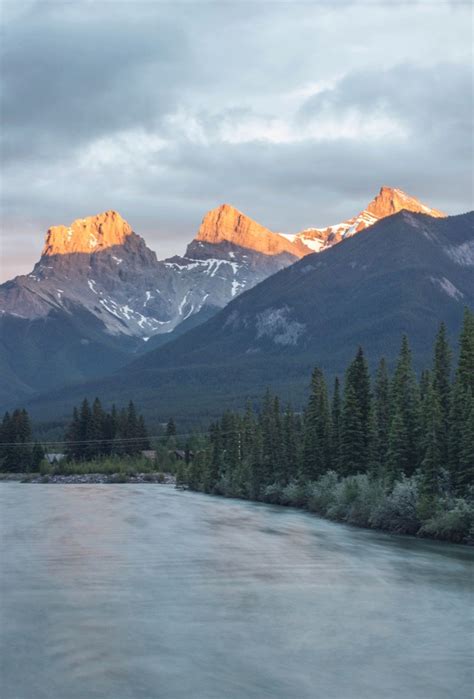 Sunset Over The Three Sisters In Canmore Alberta Travel Inspiration